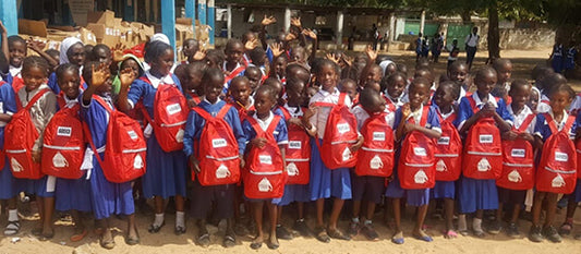 Distributing Blake’s SchoolBags in The Gambia